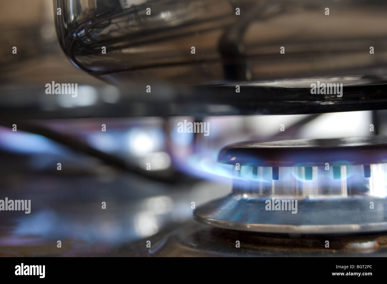 Blue flames from a gas cooker Stock Photo Alamy