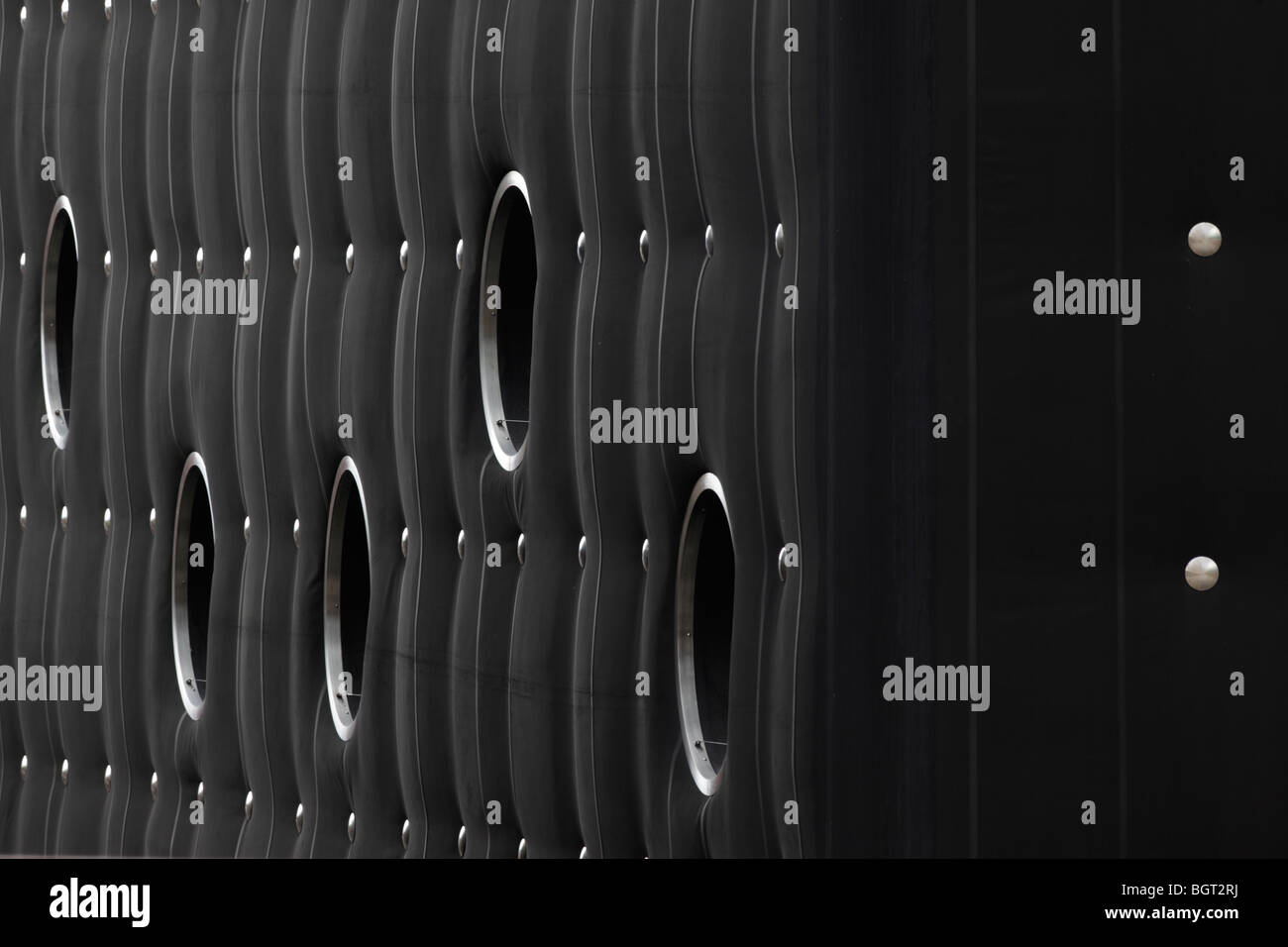 detail of facade of the soundhouse with porthole windows and steel