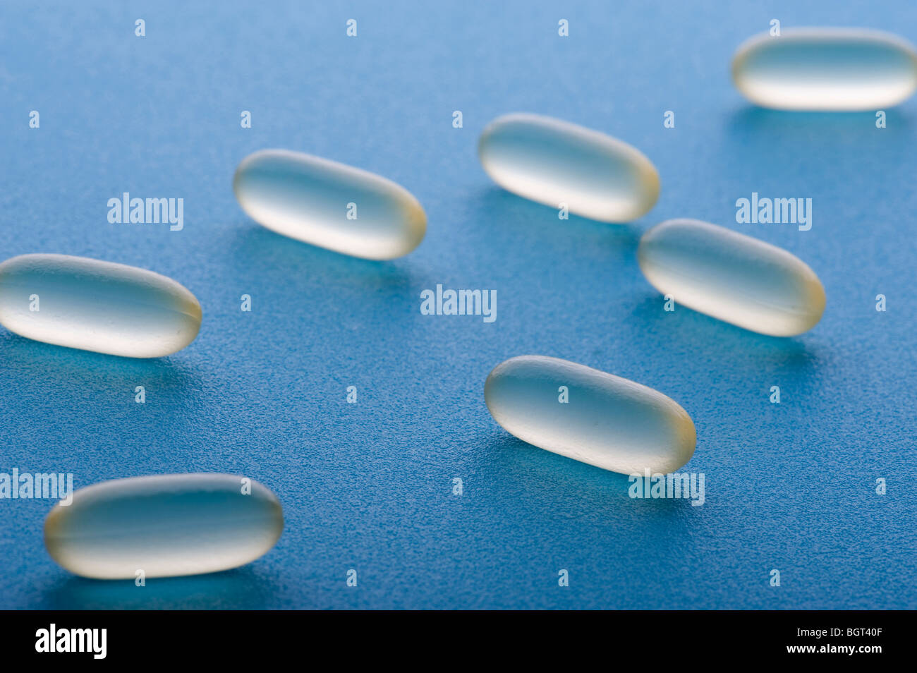object on blue - Medical Tablets close up Stock Photo - Alamy