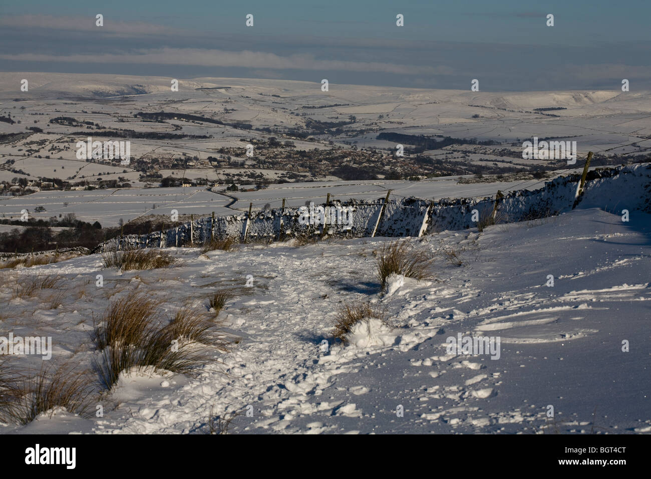 Winter landscape looking toward Kinder Scout from Lyme Handley  above Lyme Park and The Gristone Trail Cheshire England Stock Photo