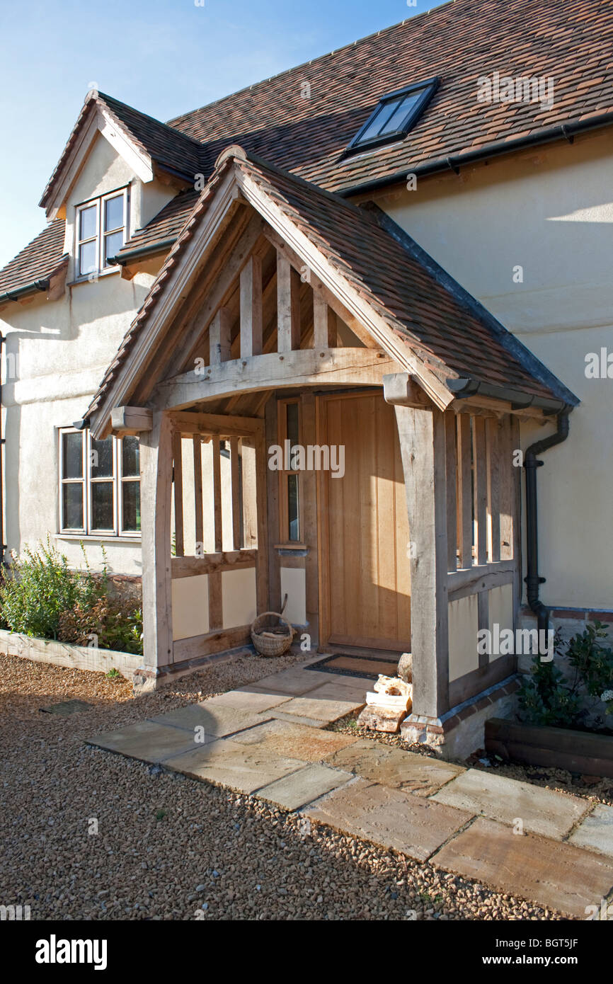 Oak framed tiled entrance porch small country cottage Beckford Gloucestershire UK Stock Photo