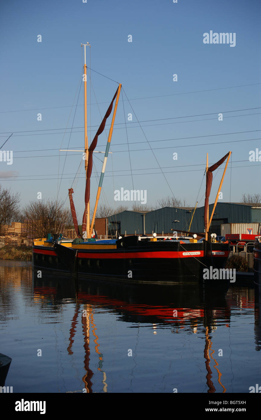 Thames Barges at their winter mooring at sunset on the River Lea, Tottenham, London, England Stock Photo