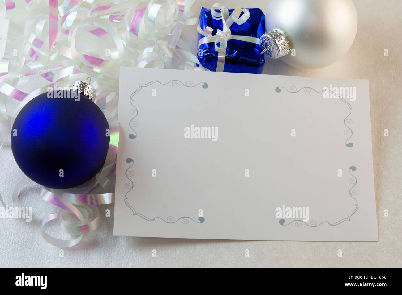 blank Christmas card with blue ornaments and copyspace Stock Photo