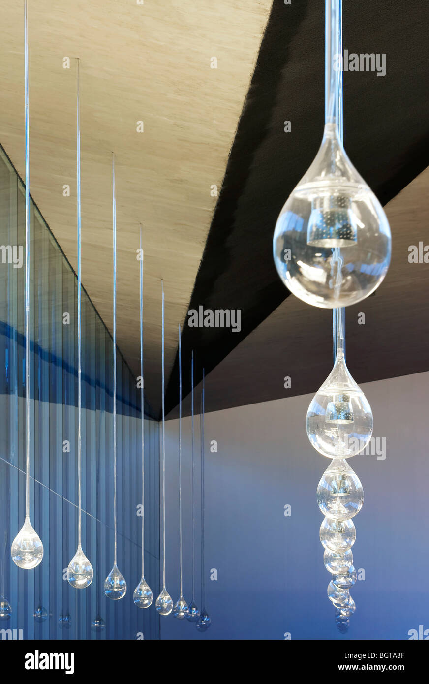 tea tenerife espacio de las artes, detail of a row of huge glass pendant lamps Stock Photo
