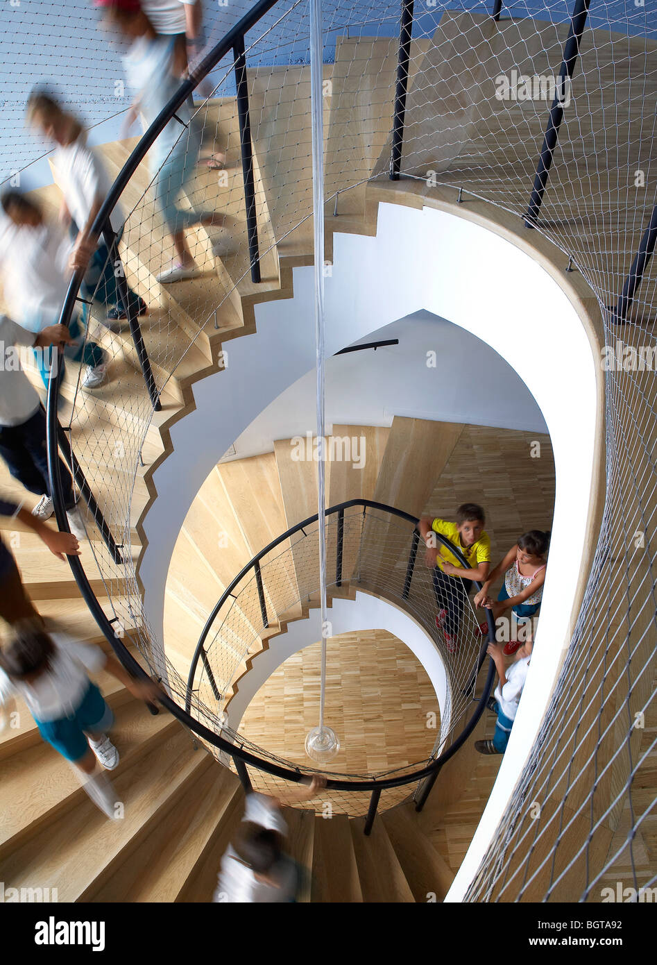 tea tenerife espacio de las artes, detail view of the people descending the spiral staircase Stock Photo