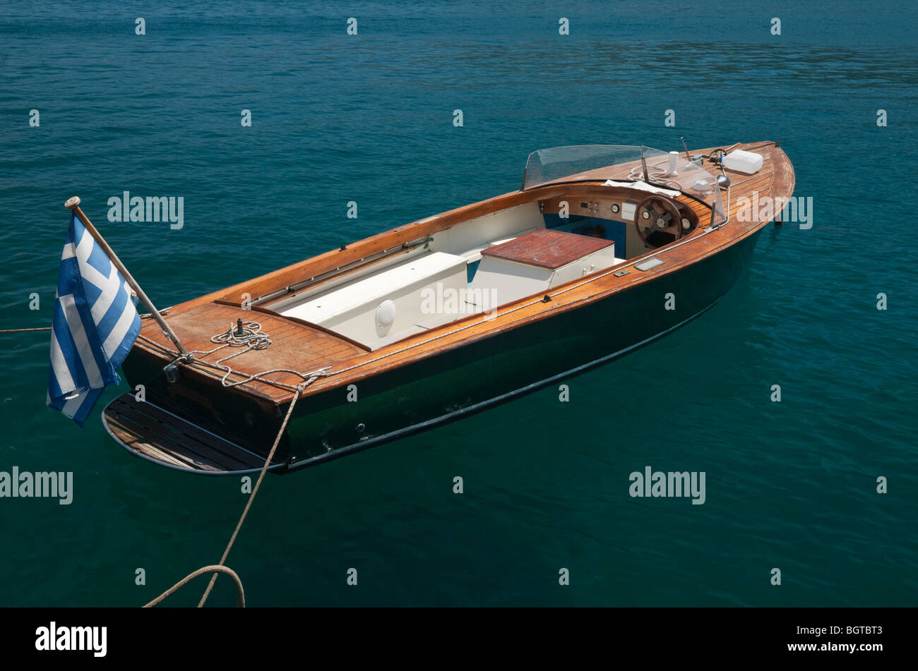 Traditional wooden speed boat moored at Poros Island, Greece Stock Photo