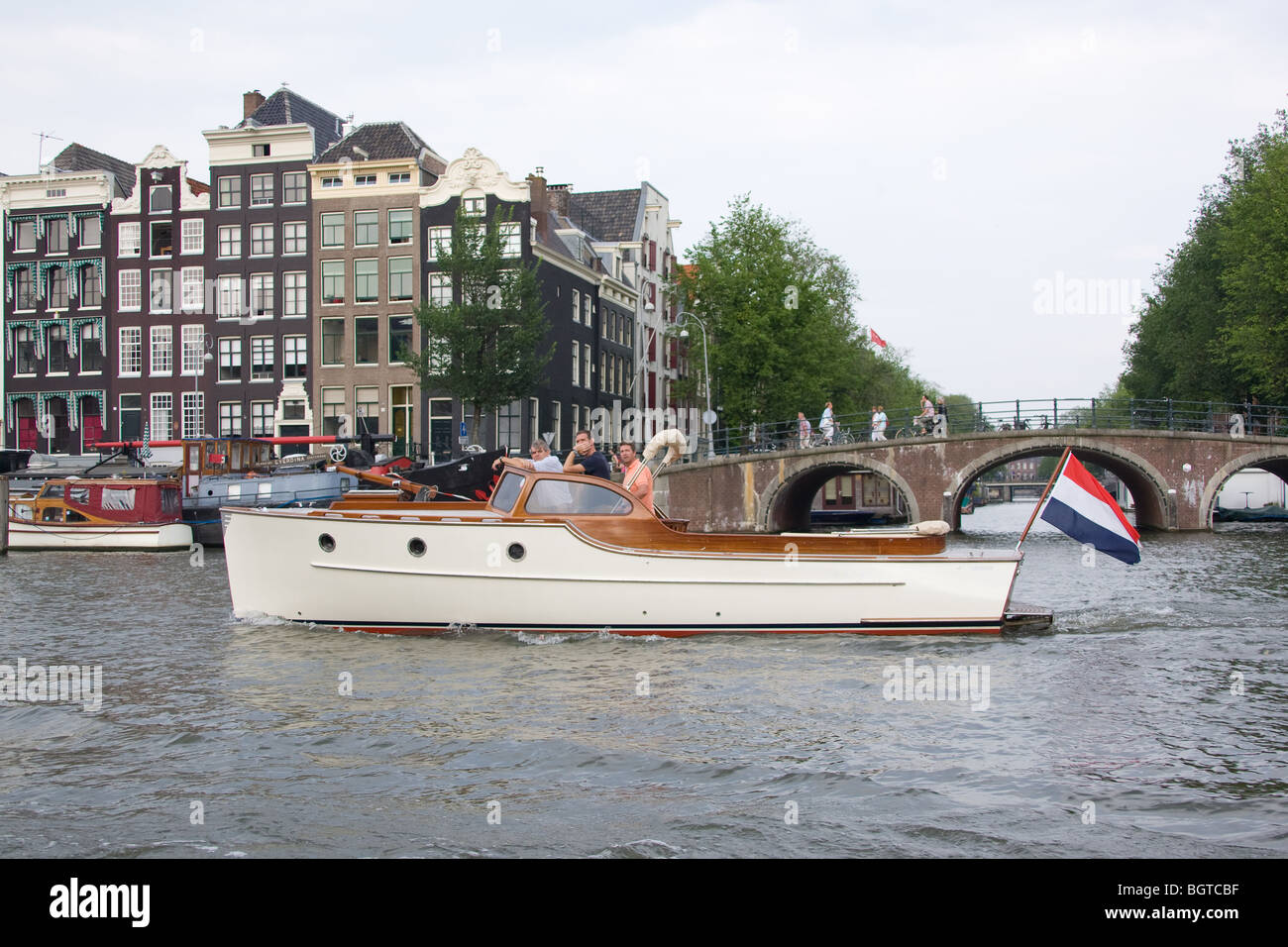 Boat in canals in Amsterdam the Netherlands Stock Photo