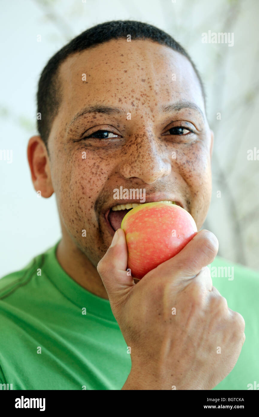 Man freckles eating apple cape hires stock photography and images Alamy