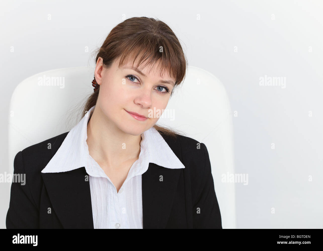 The artful young beautiful woman in a black suit Stock Photo - Alamy