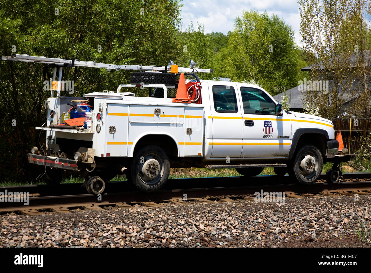 Pickup truck fitted with Hi-Rail attachment allowing it to run on the railroad tracks. Steamboat Springs, Colorado, USA Stock Photo