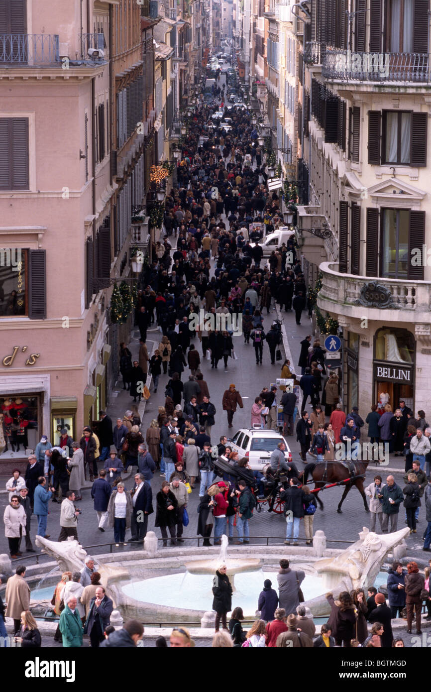 Italy, Rome, Piazza di Spagna, Barcaccia fountain and Via dei Condotti Stock Photo