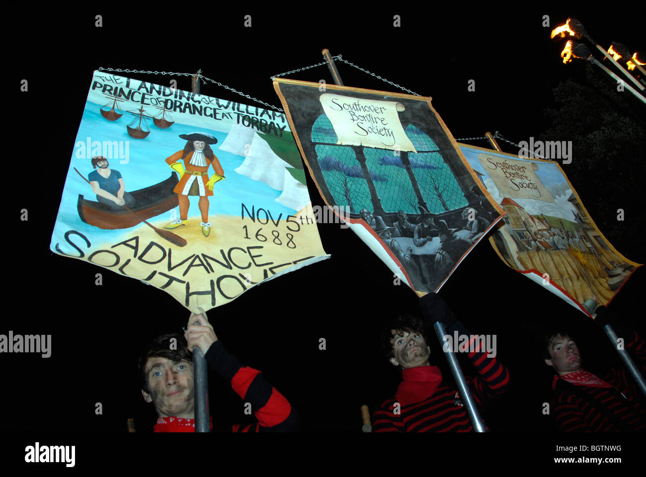 Banners at Lewes bonfire night parade celebrating the defeat of Guy ...