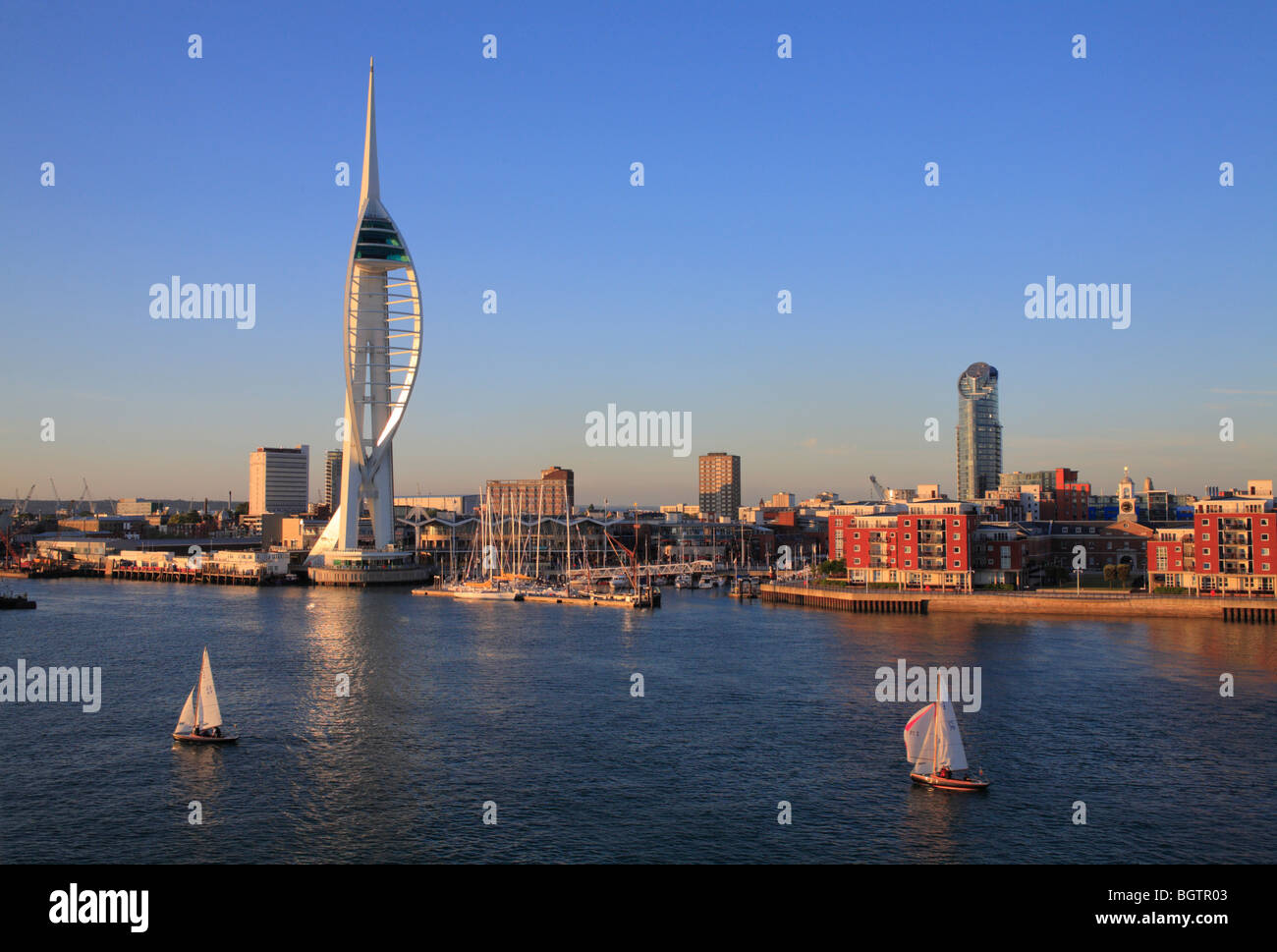The Spinnaker Tower and part of Portsmouth harbour and waterfront in evening light. Hampshire, England. Stock Photo
