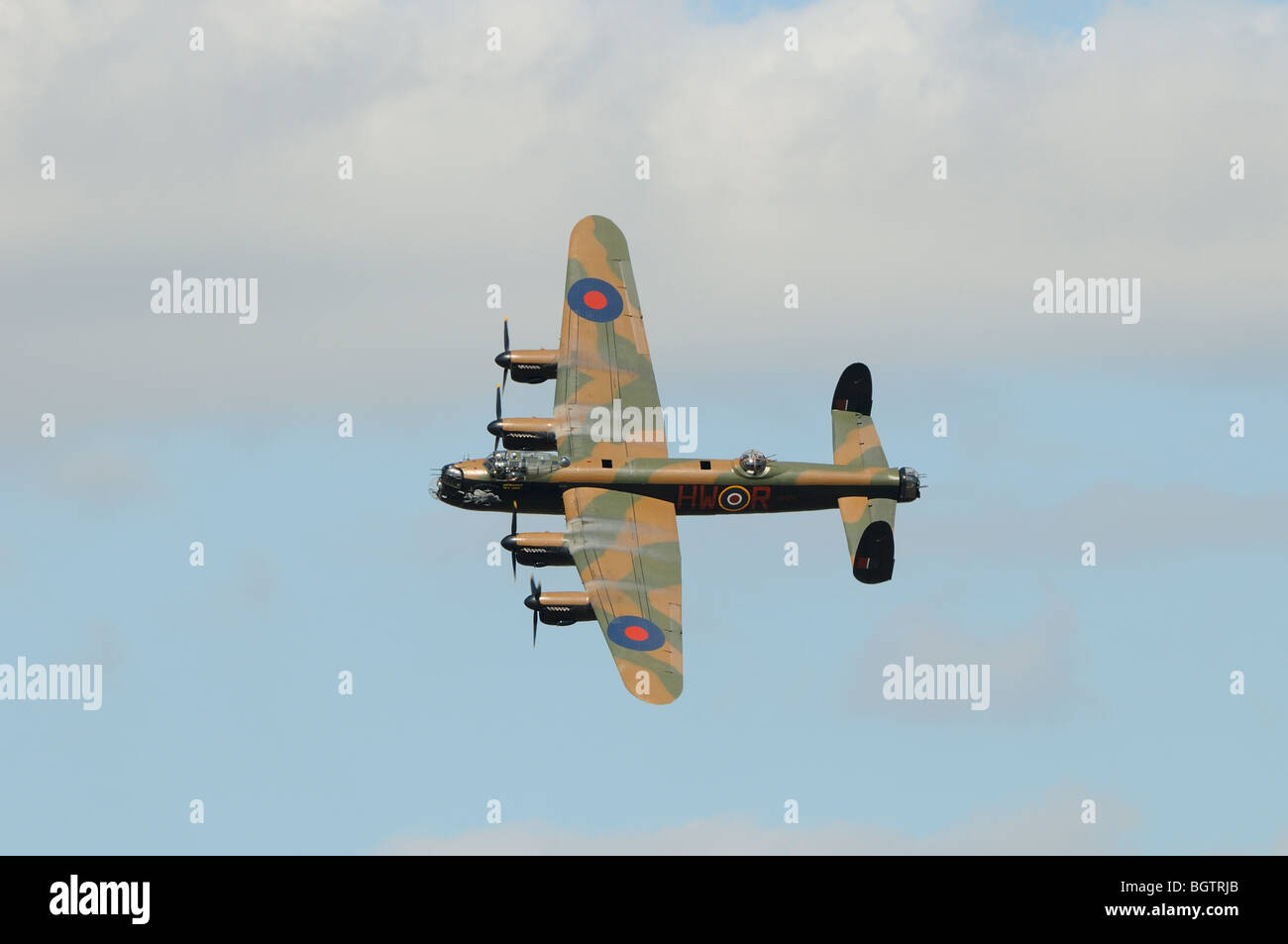 Lancaster Bomber, Battle of Britain flight, flying over Oxfordshire, UK. Stock Photo