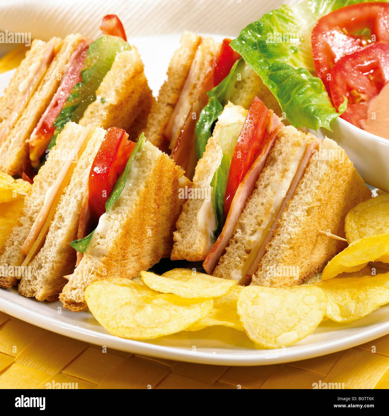 Toasted club sandwich served on a plate Stock Photo Alamy