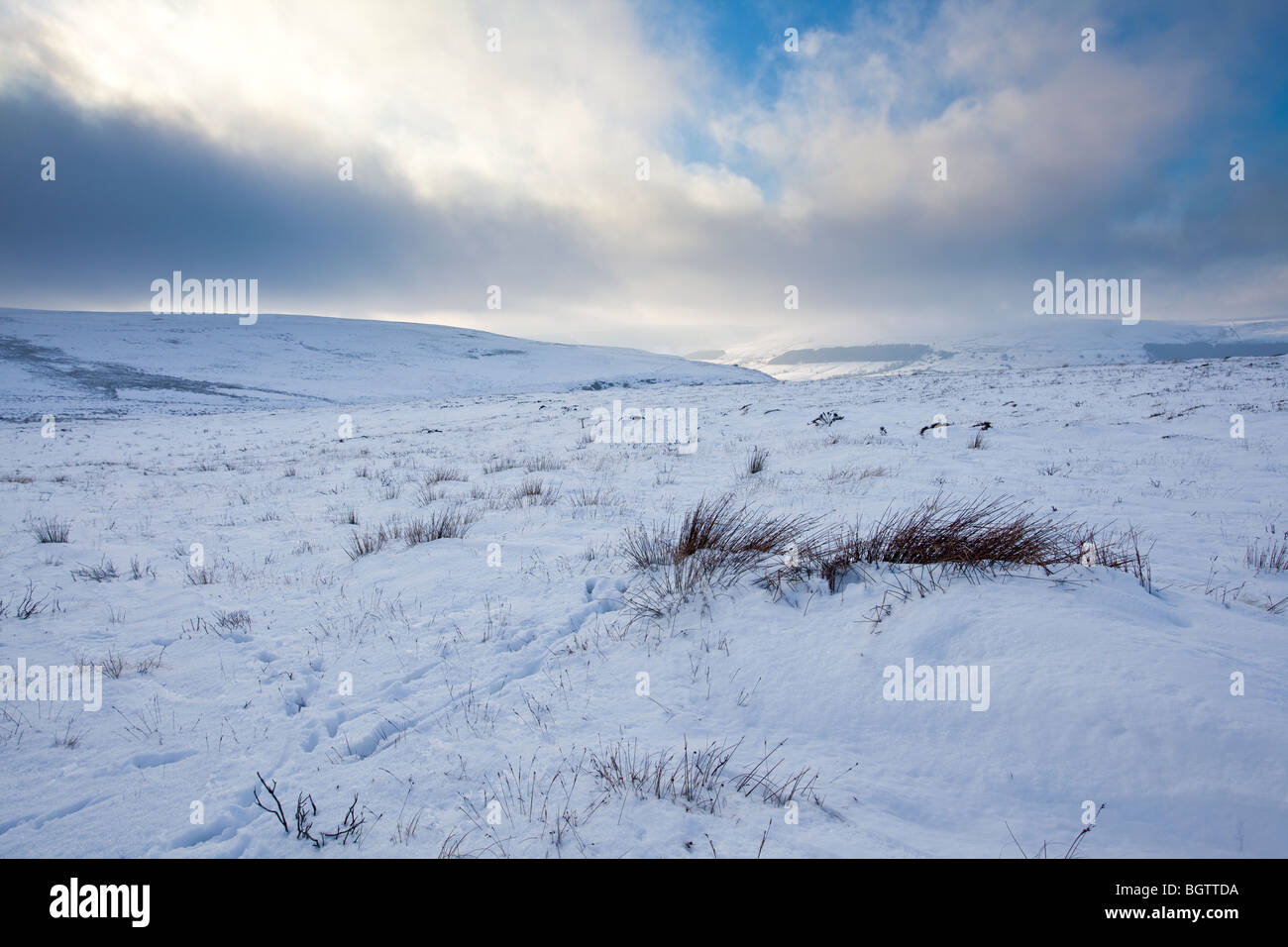 The North Yorkshire Moors completely covered in snow on a beautifully bright clear winter's day Stock Photo