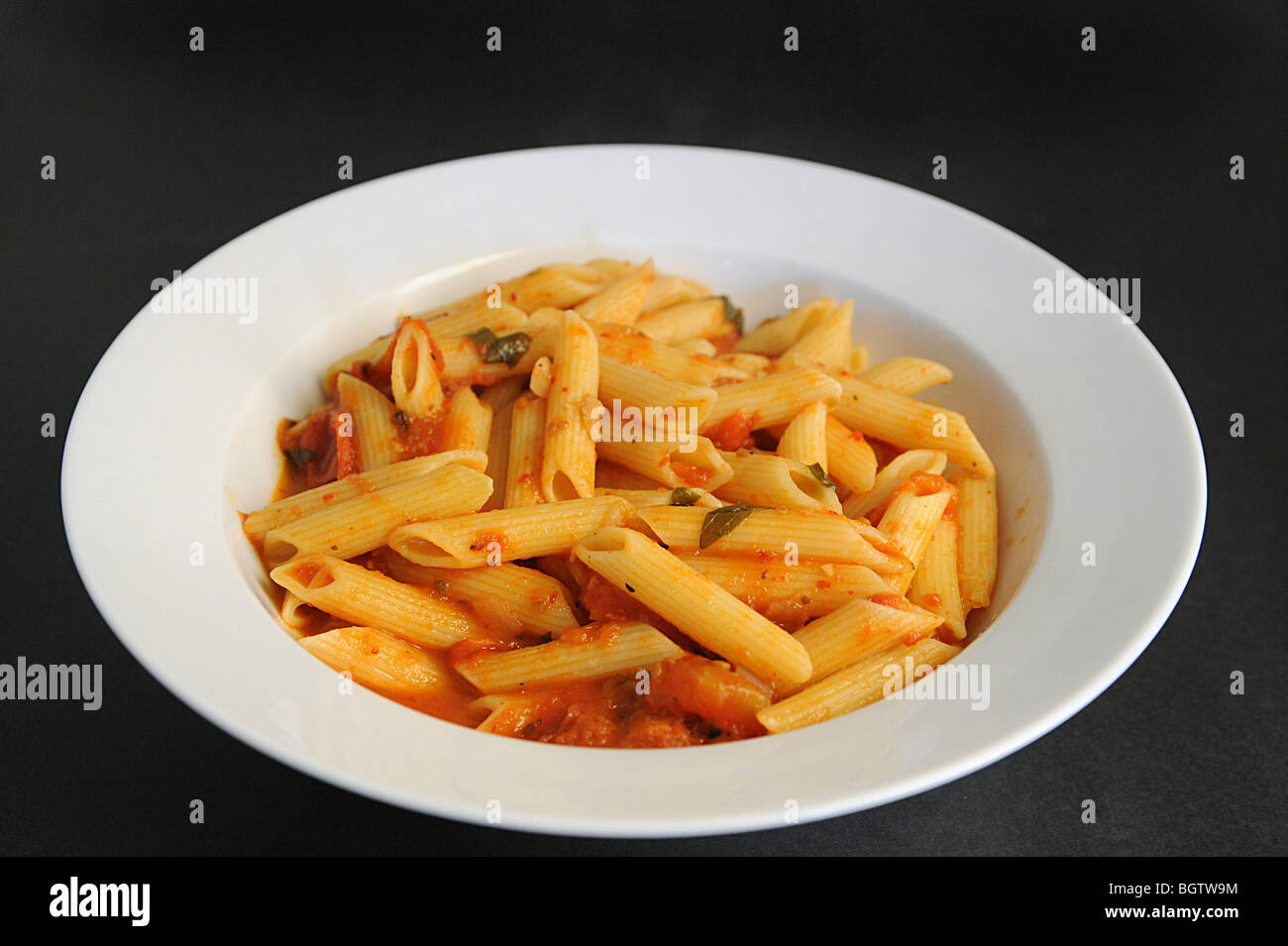 A serving of Penne pasta with tomato sauce Stock Photo Alamy