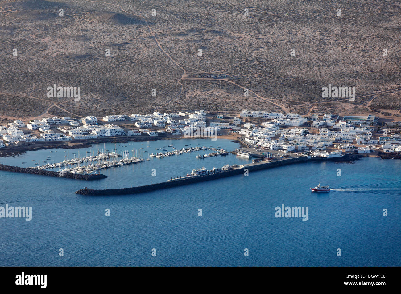 La Graciosa Island with the harbour and town of Caleta del Sebo, view from the Mirador del Rio, Lanzarote, Canary Islands, Spai Stock Photo