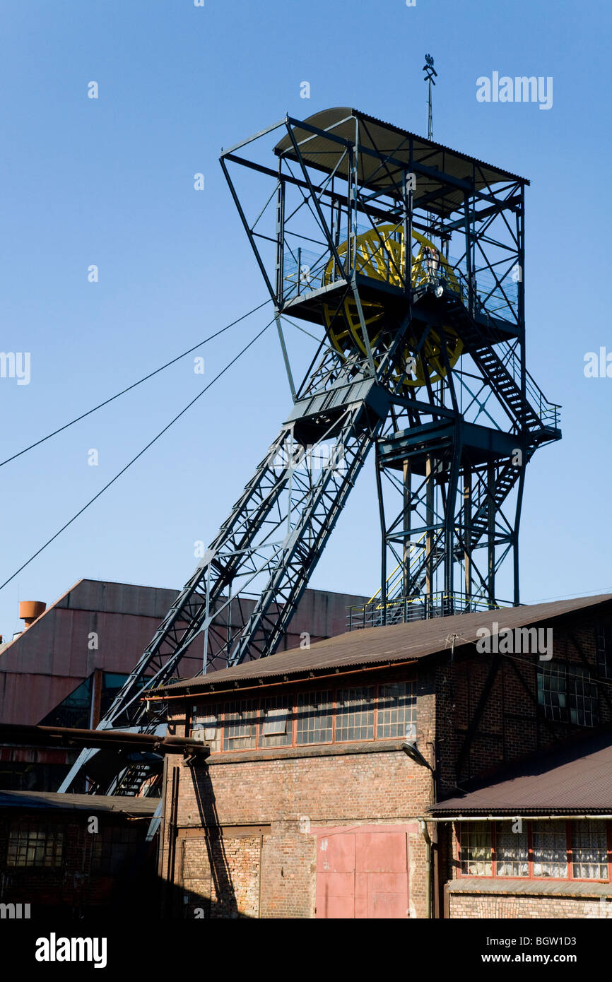 Mine head headgear / lift cage winding gear tower at the Louisa coal mine museum. Zabrze, Silesia. Poland. Stock Photo