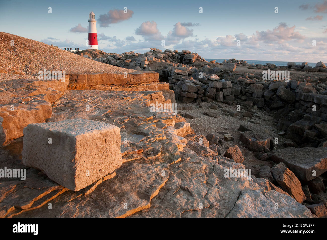 Portland Bill lighthouse and disused quarried Portland stone near Weymouth, Dorset, England, United Kingdom Stock Photo