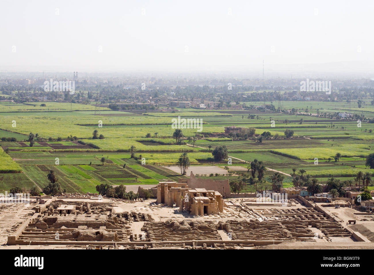 View from the Theban Hills of Nile Valley and Ramasseum, Mortuary Temple of Ramesses II on West Bank of the Nile at Luxor, Egypt Stock Photo