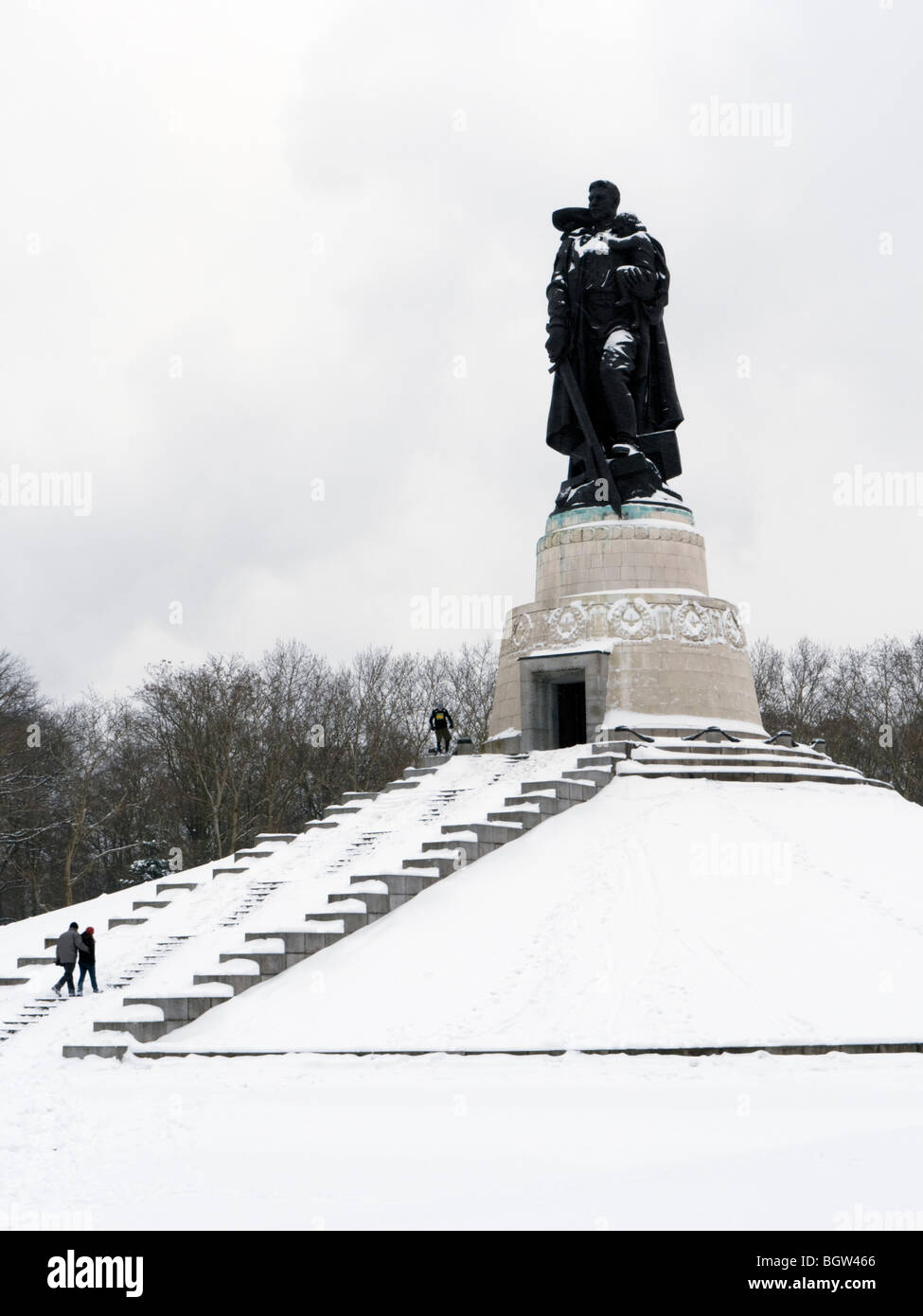 Soviet war memorial during winter snow in Treptower Park in Berlin Germany Stock Photo