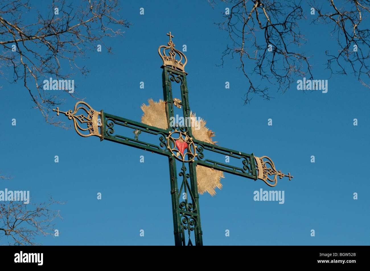 Church cross in the village St Jean de Bueges, Herault, Southern France Stock Photo