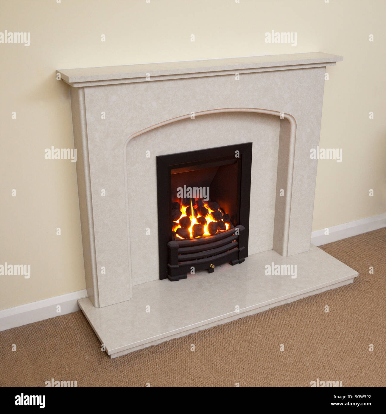 marble fireplace with gas fire flames Stock Photo Alamy