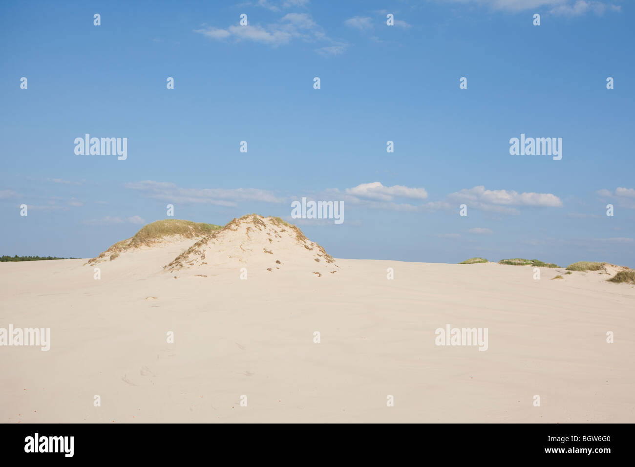 Waves of sand - formed by wind and water Stock Photo