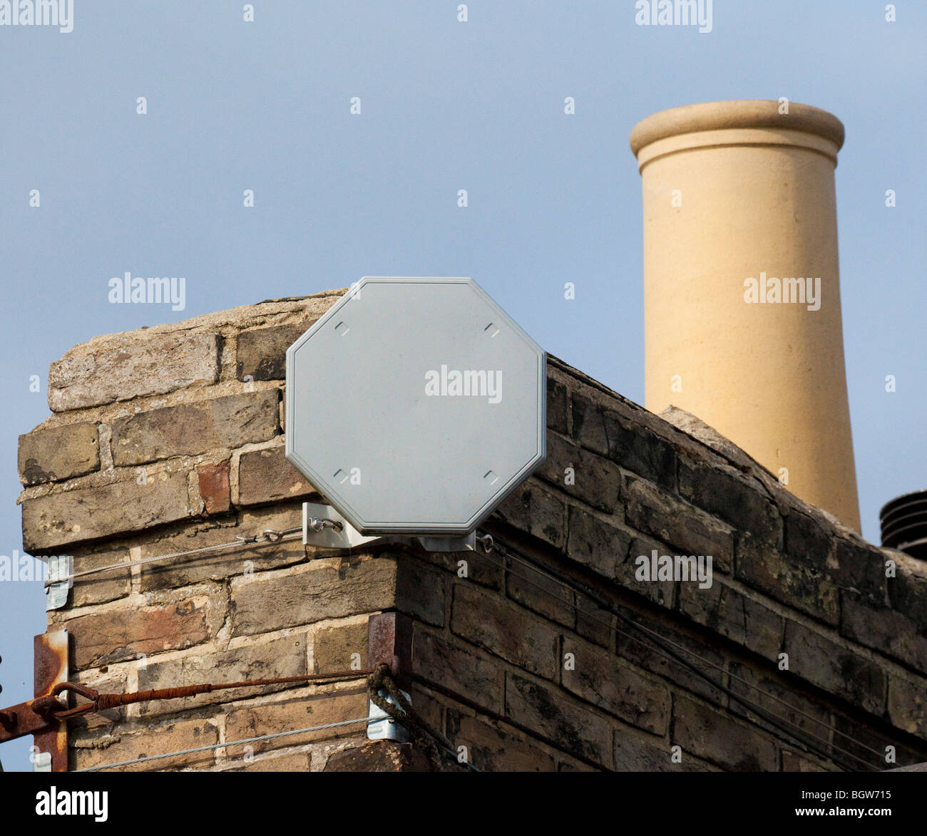 Ionica dish / antenna on a chimney Stock Photo