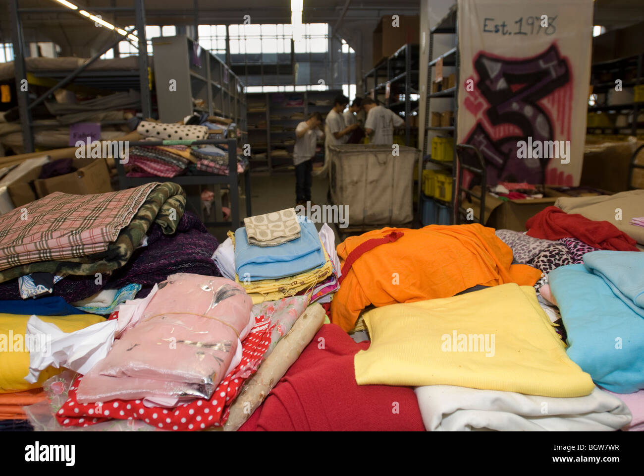 Volunteers sort donated materials at the Material for the Arts (MFTA
