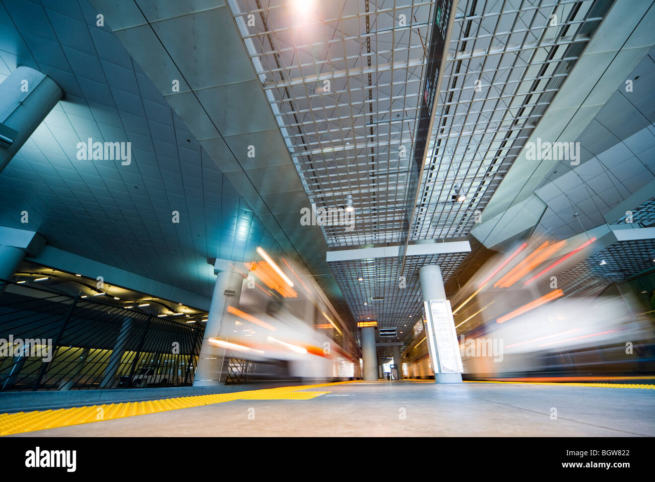 Denver, Colorado, two Trams at the station underneath Denver Colorado Convention Center. Entering and leaving the station. Stock Photo