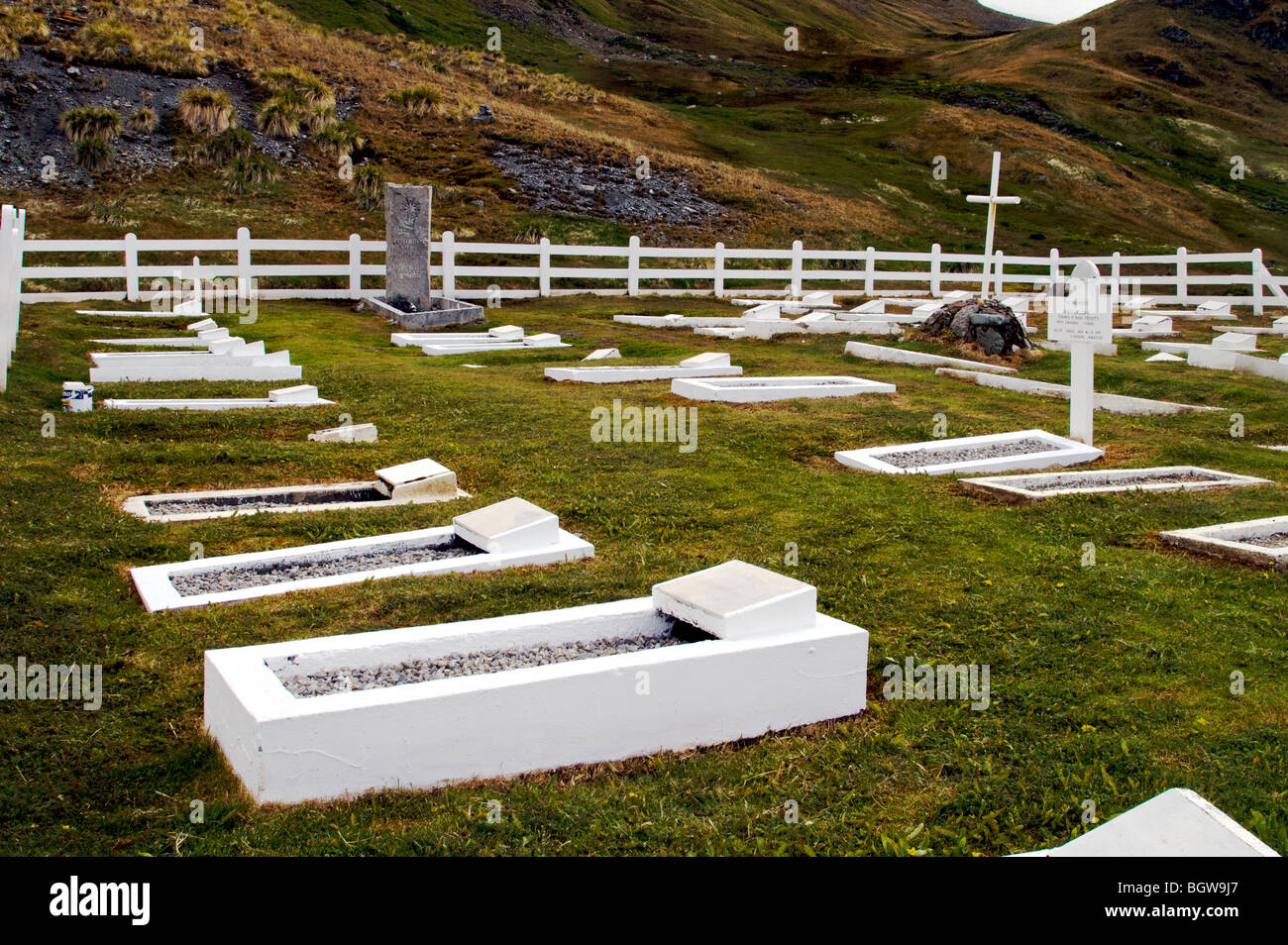 Old whaler's graveyard in Grytviken, South Georgia. Famed explorer Sir Ernest Shackleton's grave is in center background. Stock Photo