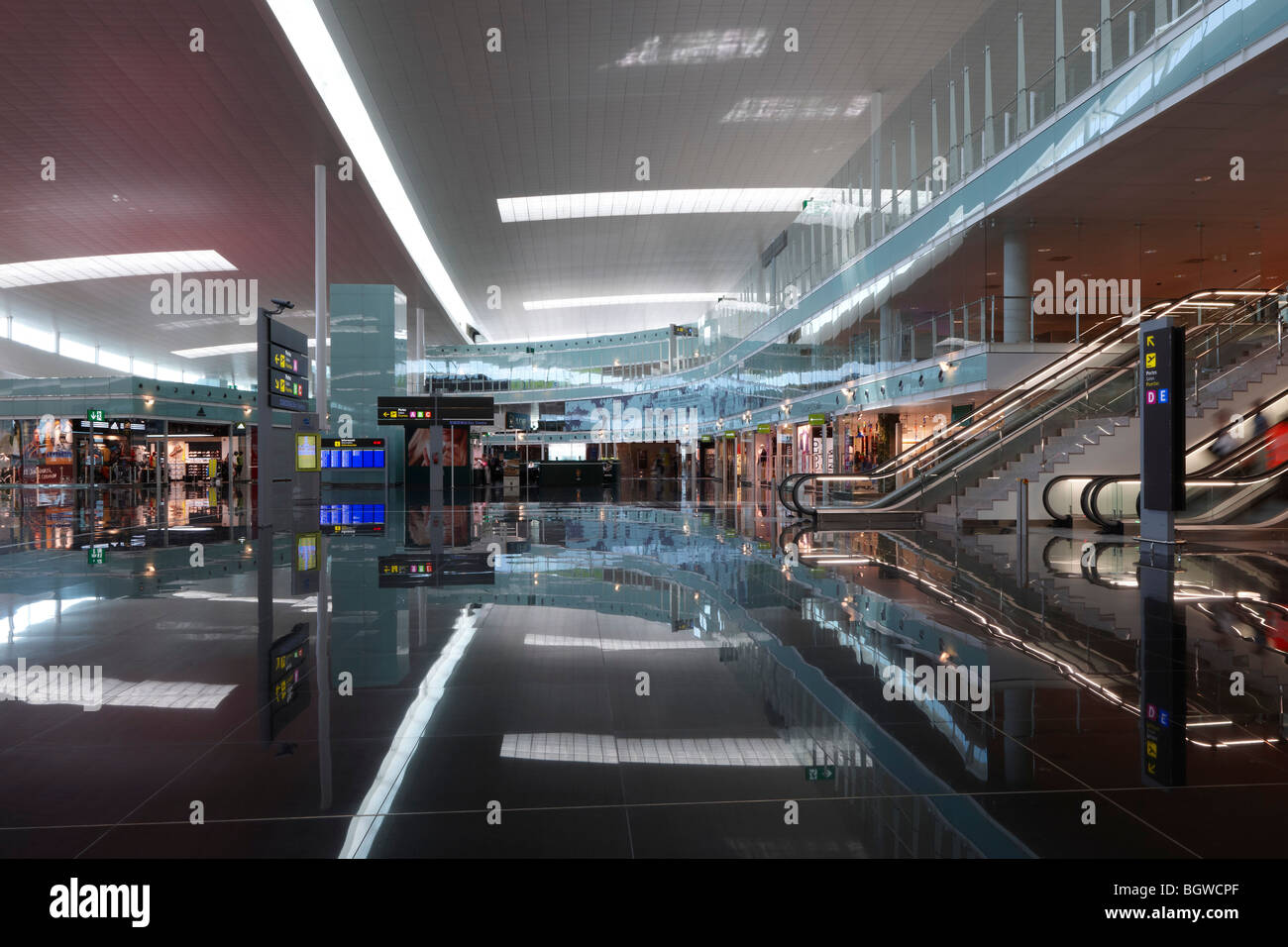 general view of naturally lit airside shopping areas in the terminal building Stock Photo