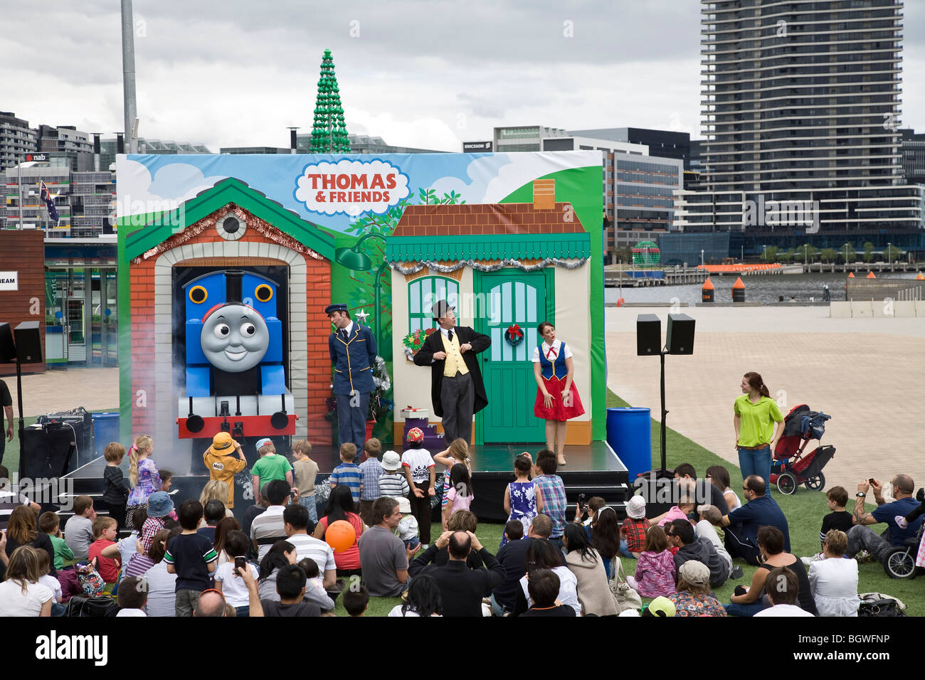 Children watching Thomas the Tank Engine at Melbourne Docklands, Australia Stock Photo