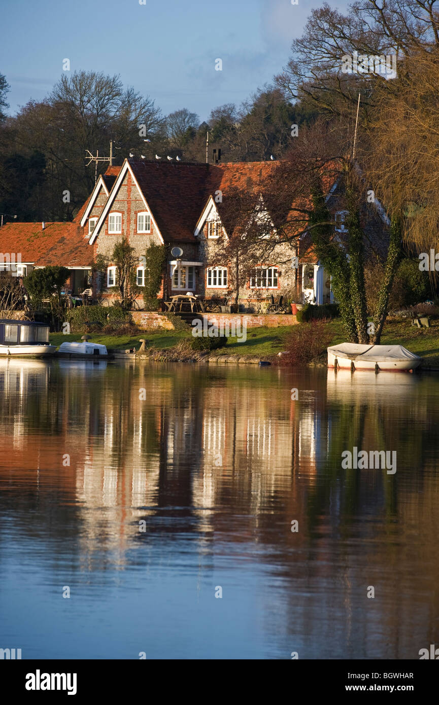 Riverside properties and houses at the River Thames upstream of Hambleden Weir Buckinghamshire UK Stock Photo