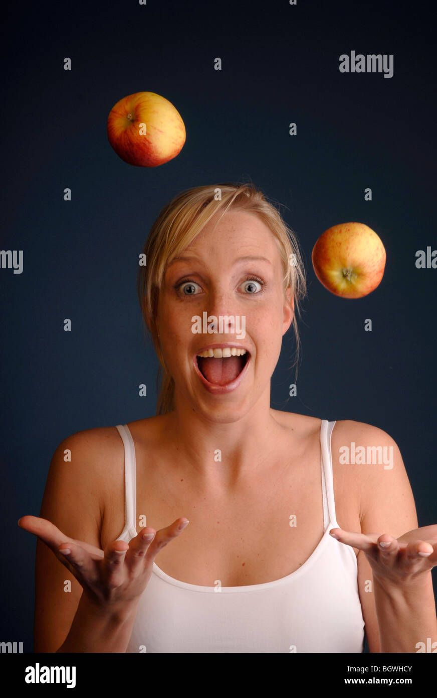 young-woman-with-apple-stock-photo-alamy