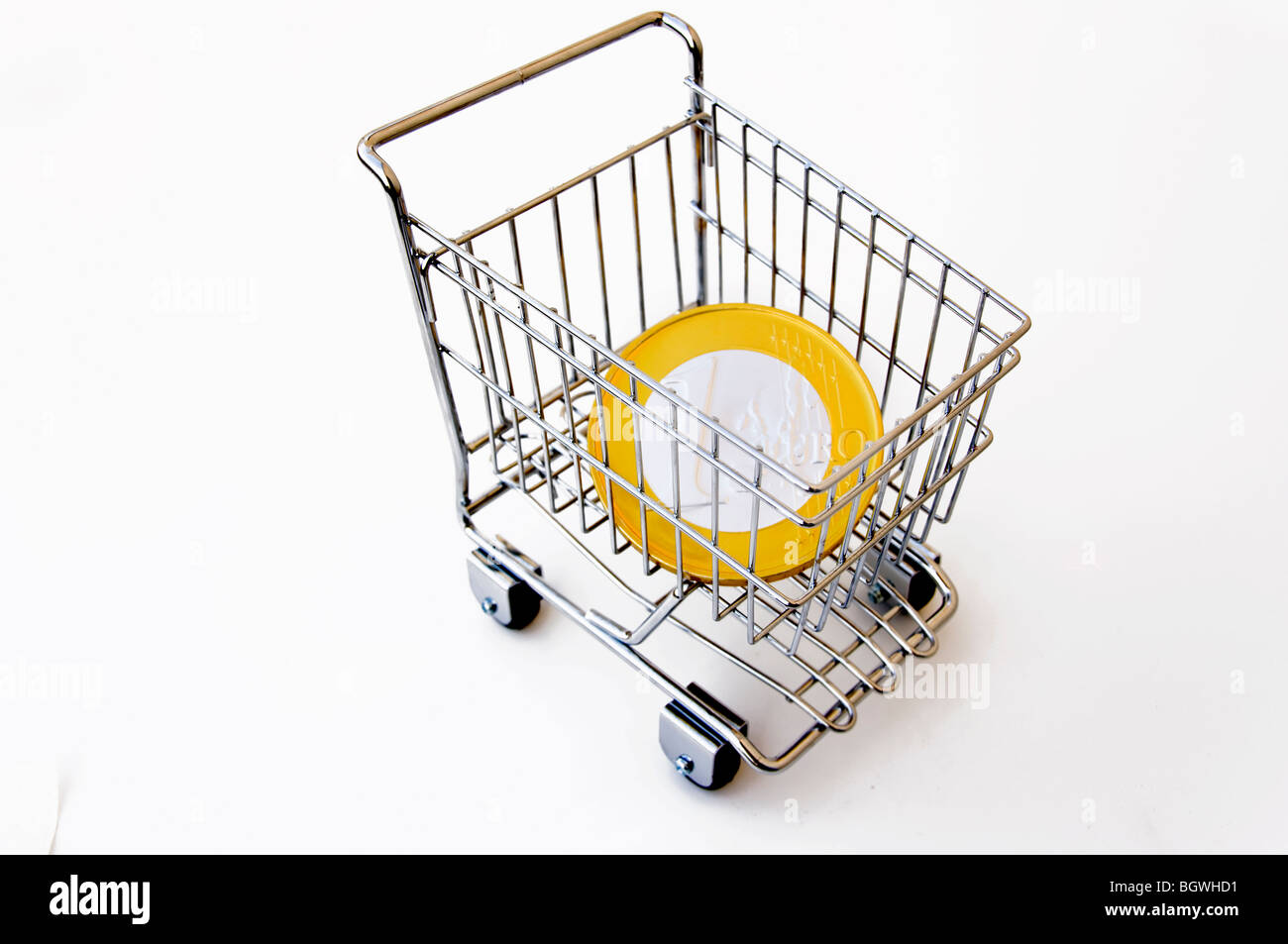 Coin in shopping cart Stock Photo Alamy