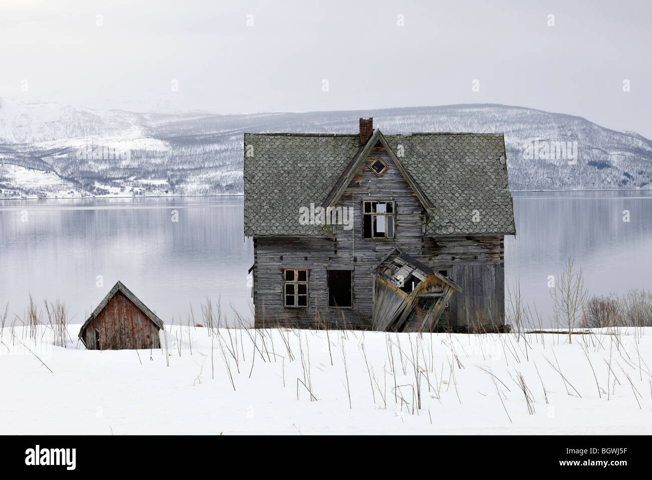 Old log house falling apart. Malangen, Troms, North Norway Stock Photo