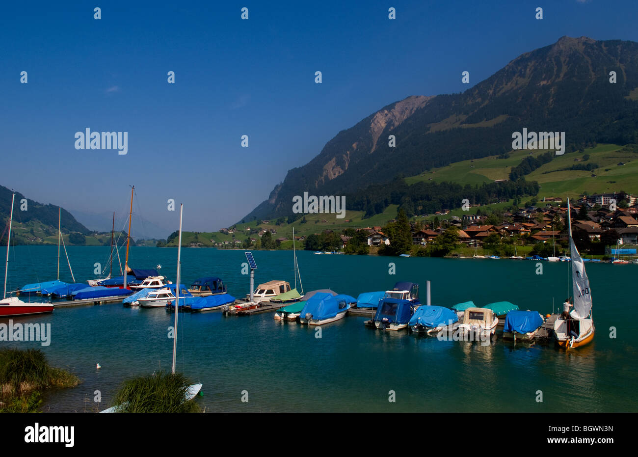 Boats on lake in beautiful Swiss Alps in Brunig near Interlaken Switzerland Stock Photo