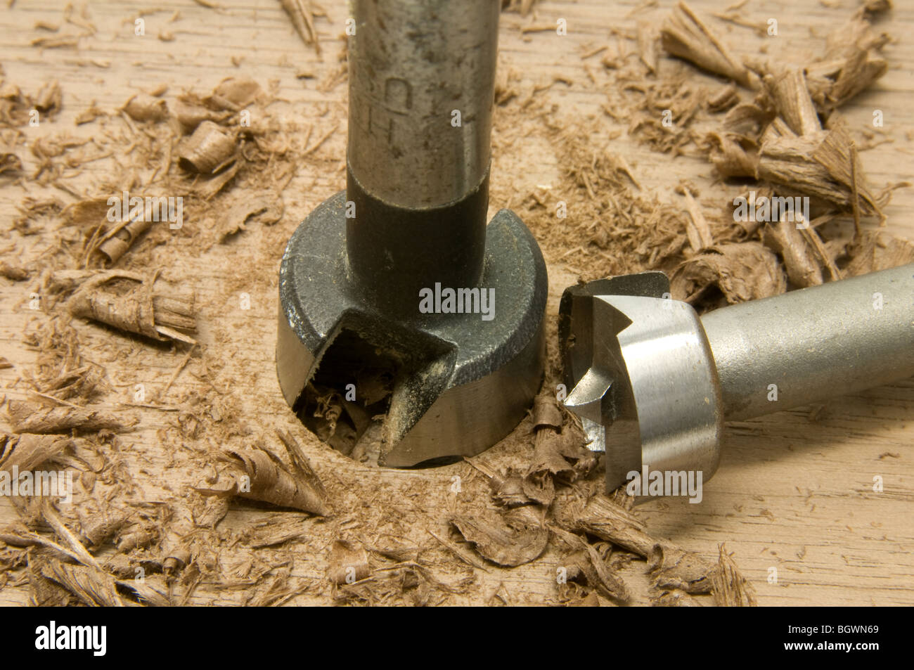 Forstner Bit drilling with shavings Stock Photo Alamy