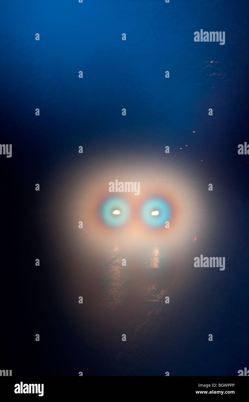 Car headlights through fog Stock Photo Alamy