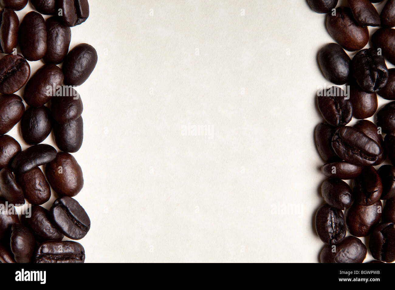 coffee beans on a parchment paper background Stock Photo