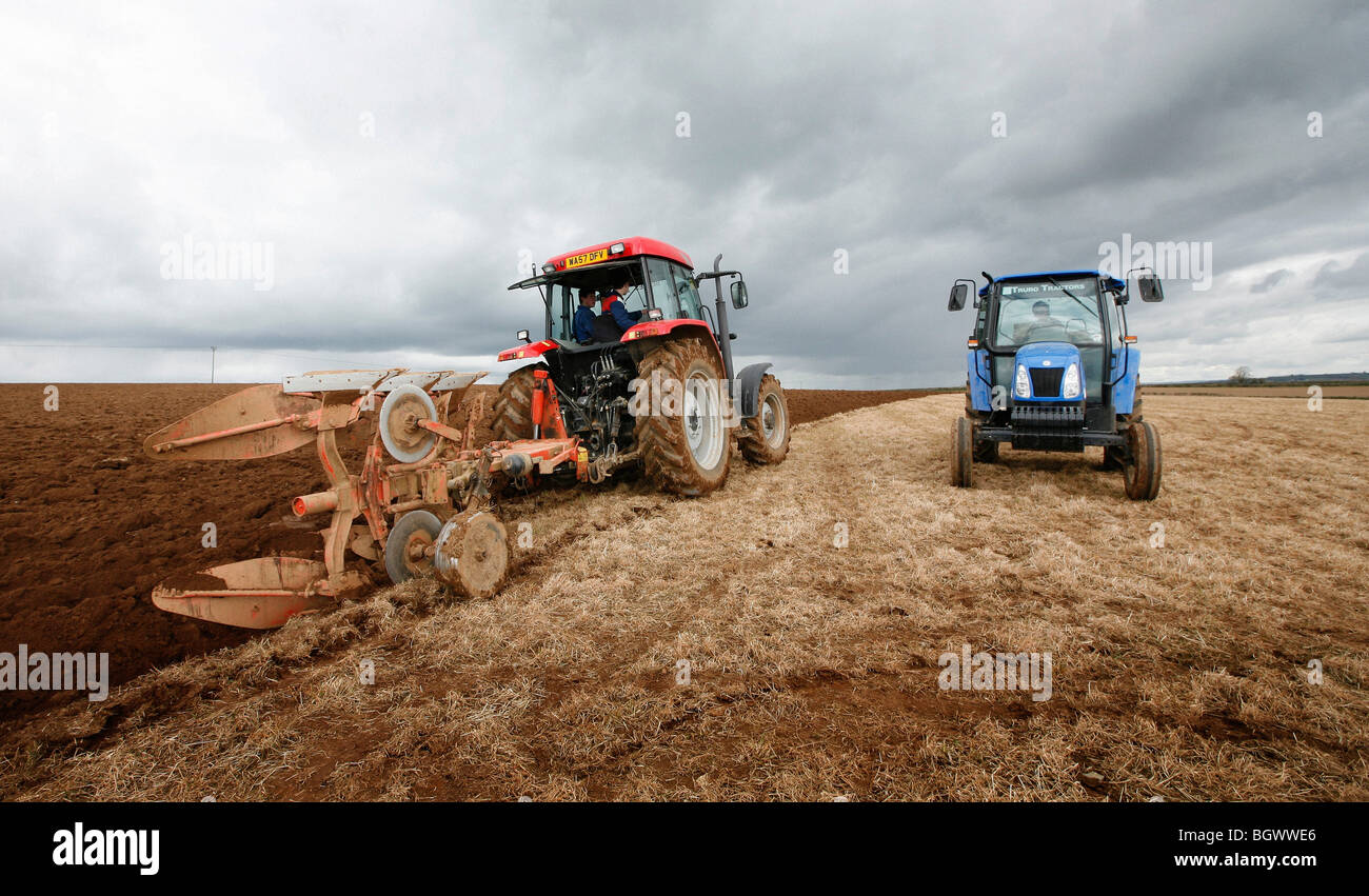 Tractor in a field Stock Photo - Alamy