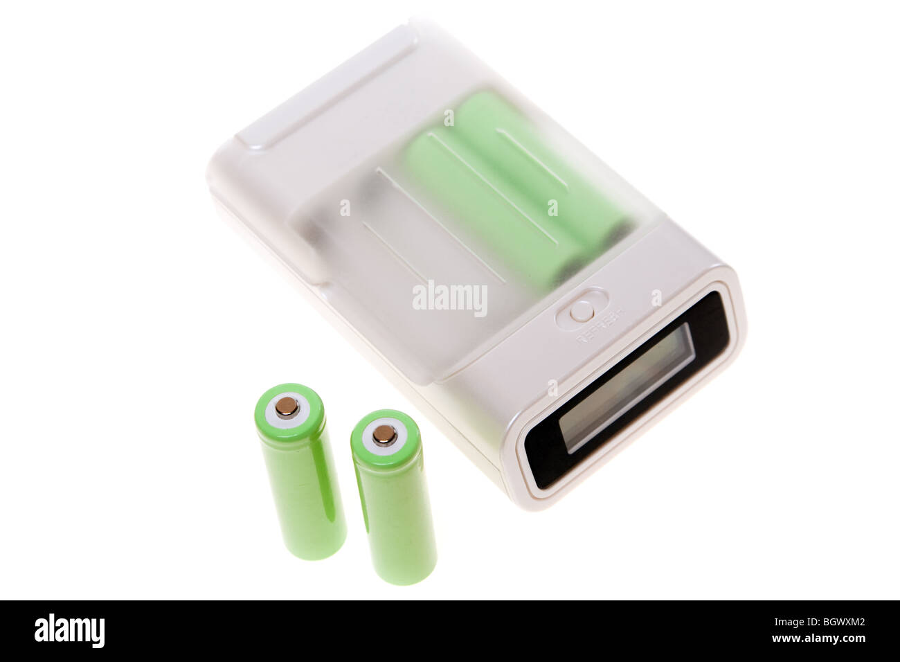 Battery charger with AA batteries. Isolated on white, clipping path included. Stock Photo
