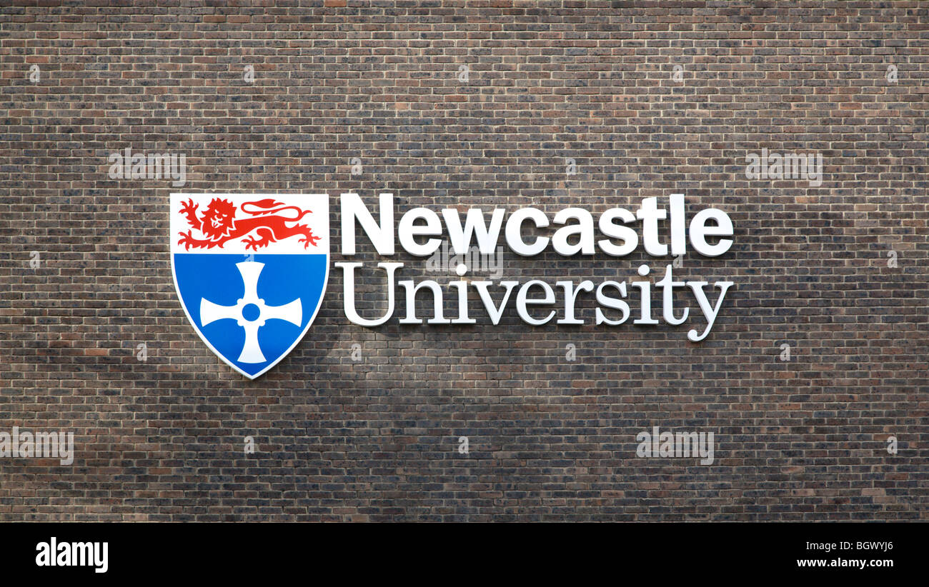Newcastle University sign and logo against brickwork Stock Photo