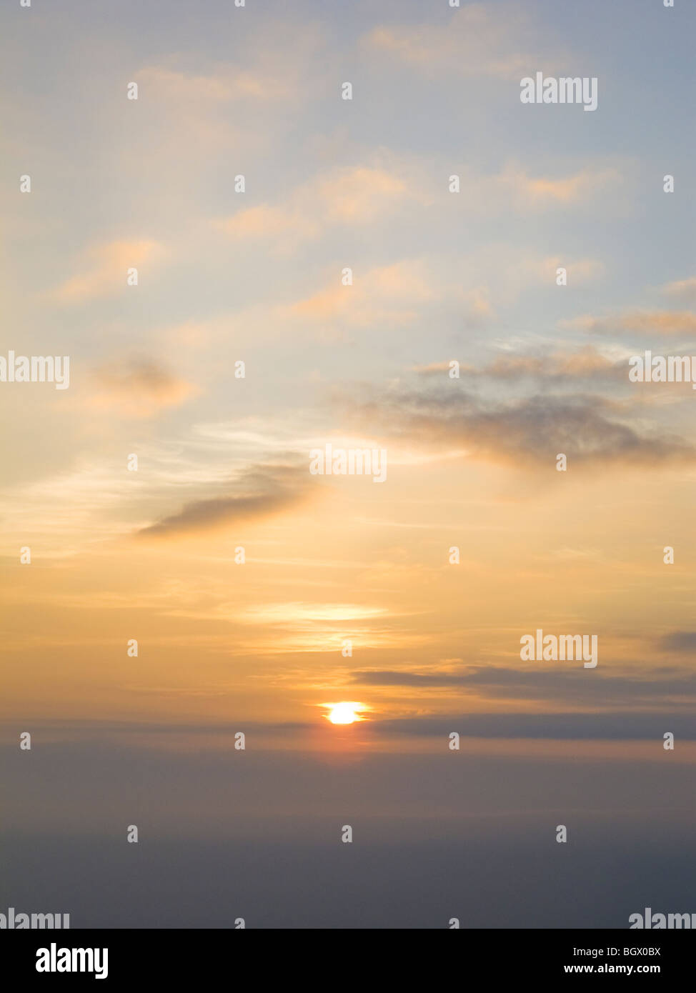 Clouds and setting sun in Nepal. Stock Photo