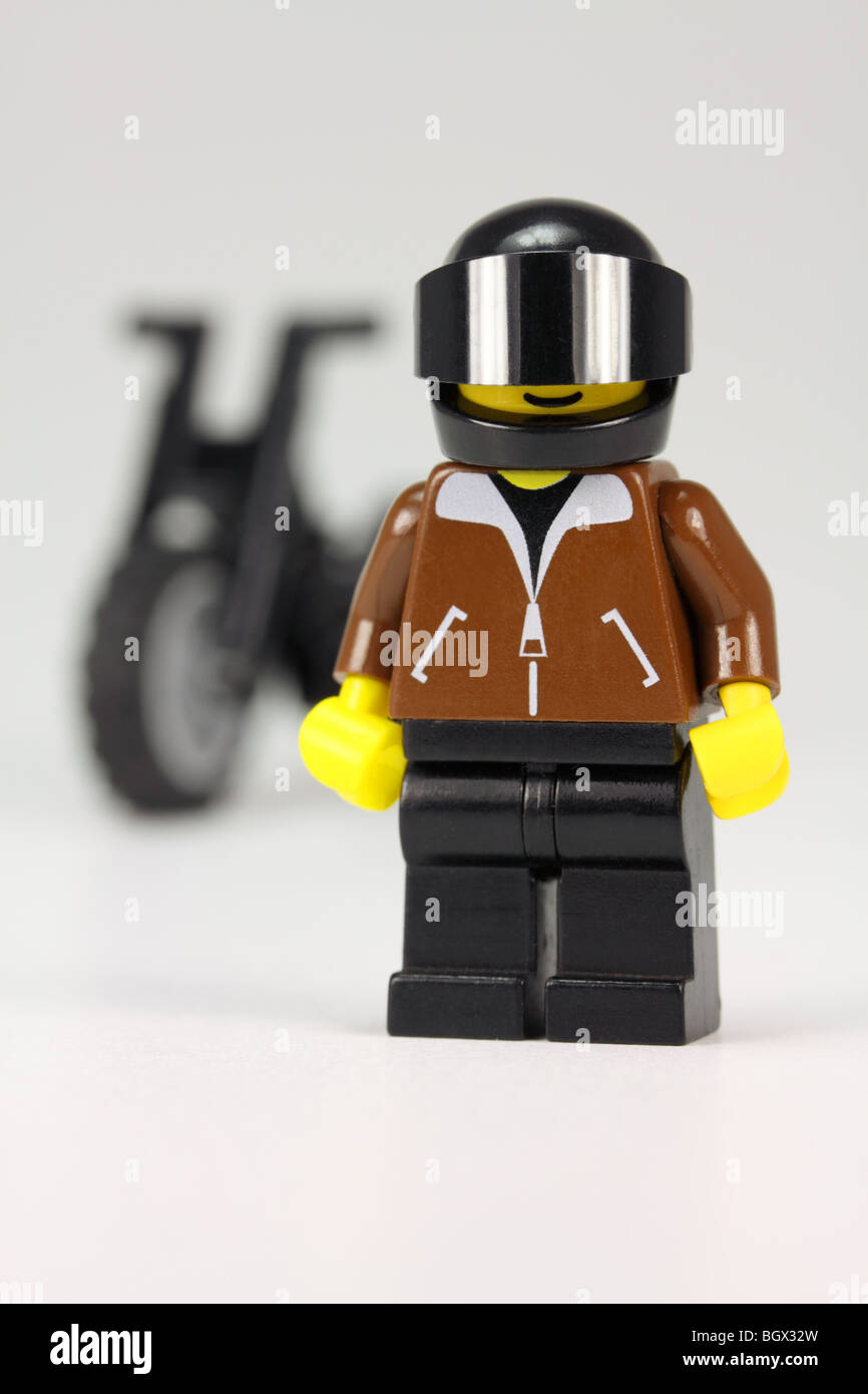 Lego motorcyclist wearing helmet with dark visor Stock Photo