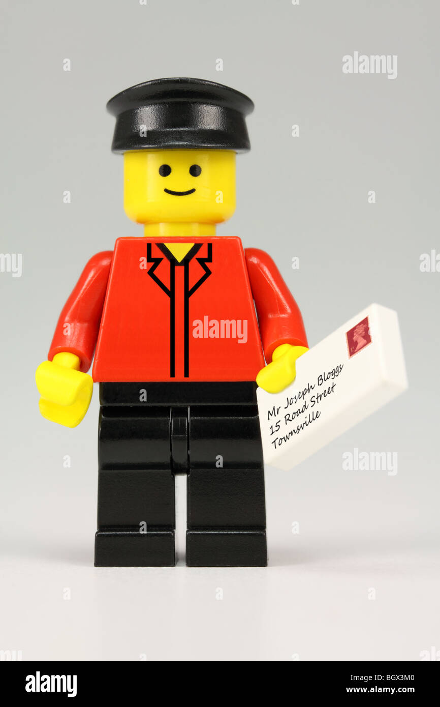 Lego postman delivering letter Stock Photo