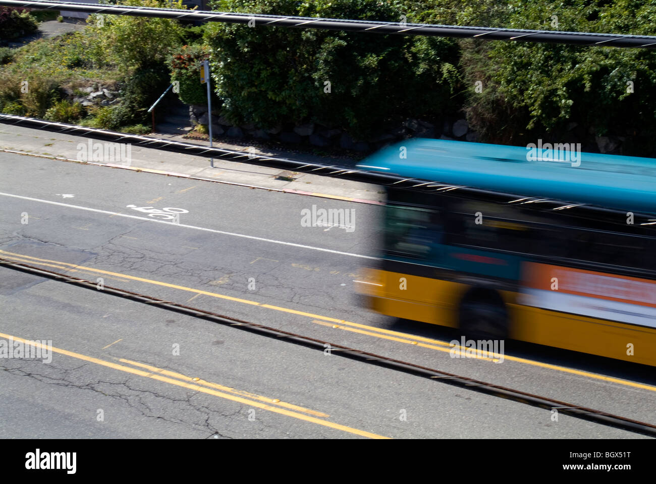 Speeding bus near bike lane Stock Photo Alamy